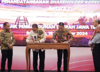 Sah ber -KUB, Bank Jatim dan Bank NTT teken SHS